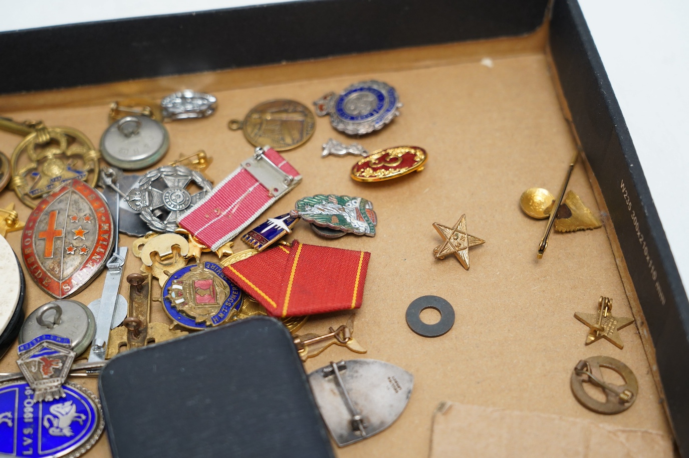 A collection of WWII sweetheart badges, silver badges, military buttons, RAF ephemera, a miniature OBE award, etc. Condition - fair to good